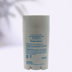 Deodorant stick with 'Alpine Spring' branding on a light gray background