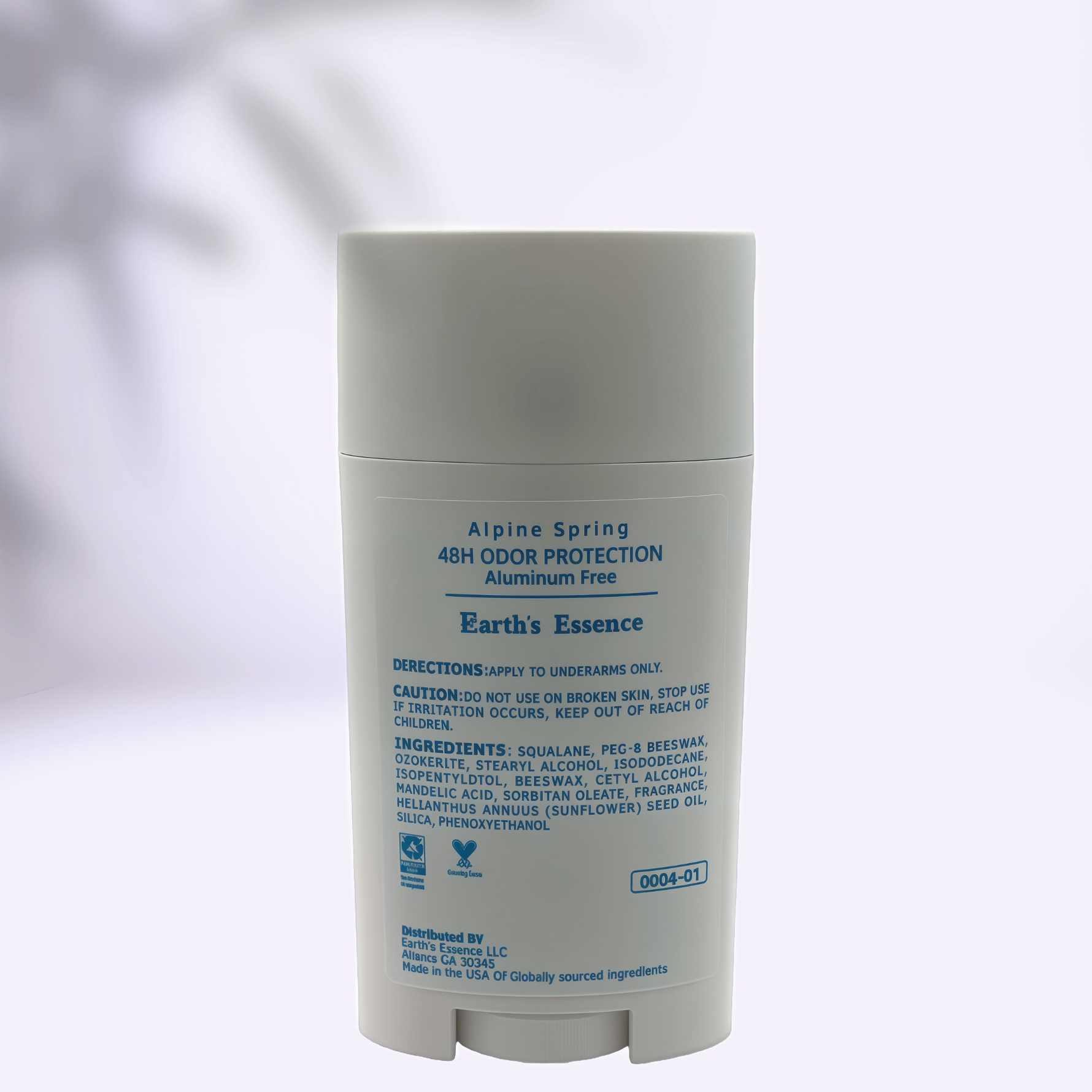 Deodorant stick with 'Alpine Spring' branding on a light gray background