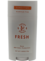 Deodorant stick with 'Earth's Essence' branding on a white background